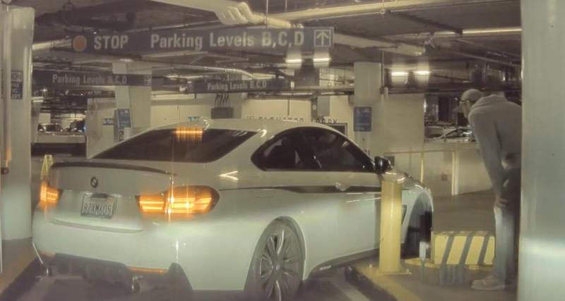  - Cette BMW est bloquée dans un parking, elle ne s'en sort pas malgré toutes ses tentatives