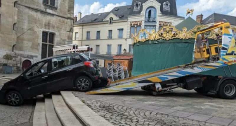  - Elle confond route et allée piétonne, elle finit bloquée dans des escaliers